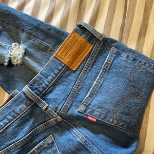 Authentic size 27 Levi wedgie jeans